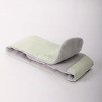 Deep Rest Sleep Mask folded open to show both sides, Honeydew Green on one and soft grey on the other, with its strap