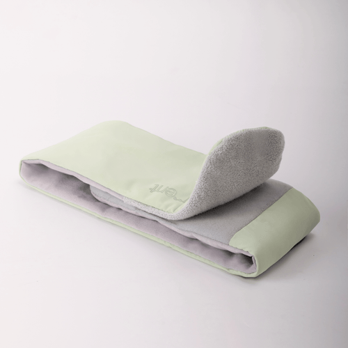 Deep Rest Sleep Mask folded open to show both sides, Honeydew Green on one and soft grey on the other, with its strap