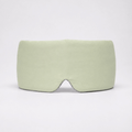 Deep Rest Sleep Mask in Honeydew Green, front view, showing the contoured nose bridge