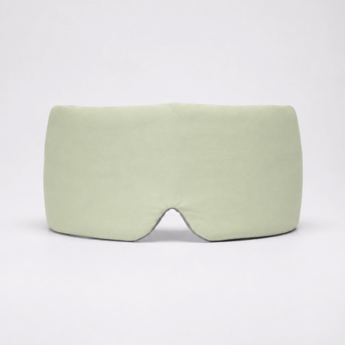 Deep Rest Sleep Mask in Honeydew Green, front view, showing the contoured nose bridge